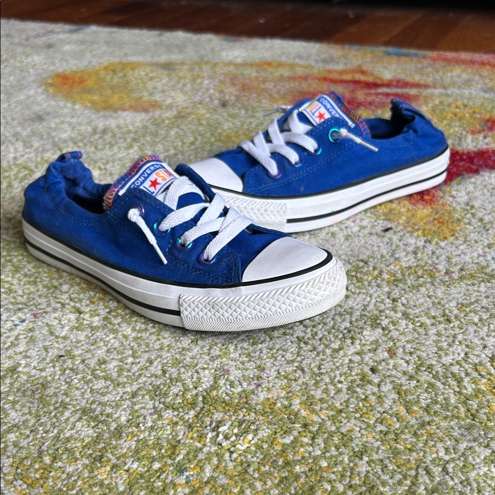 Women’s Converse slip in Sneakers in Vibrant Blue and White